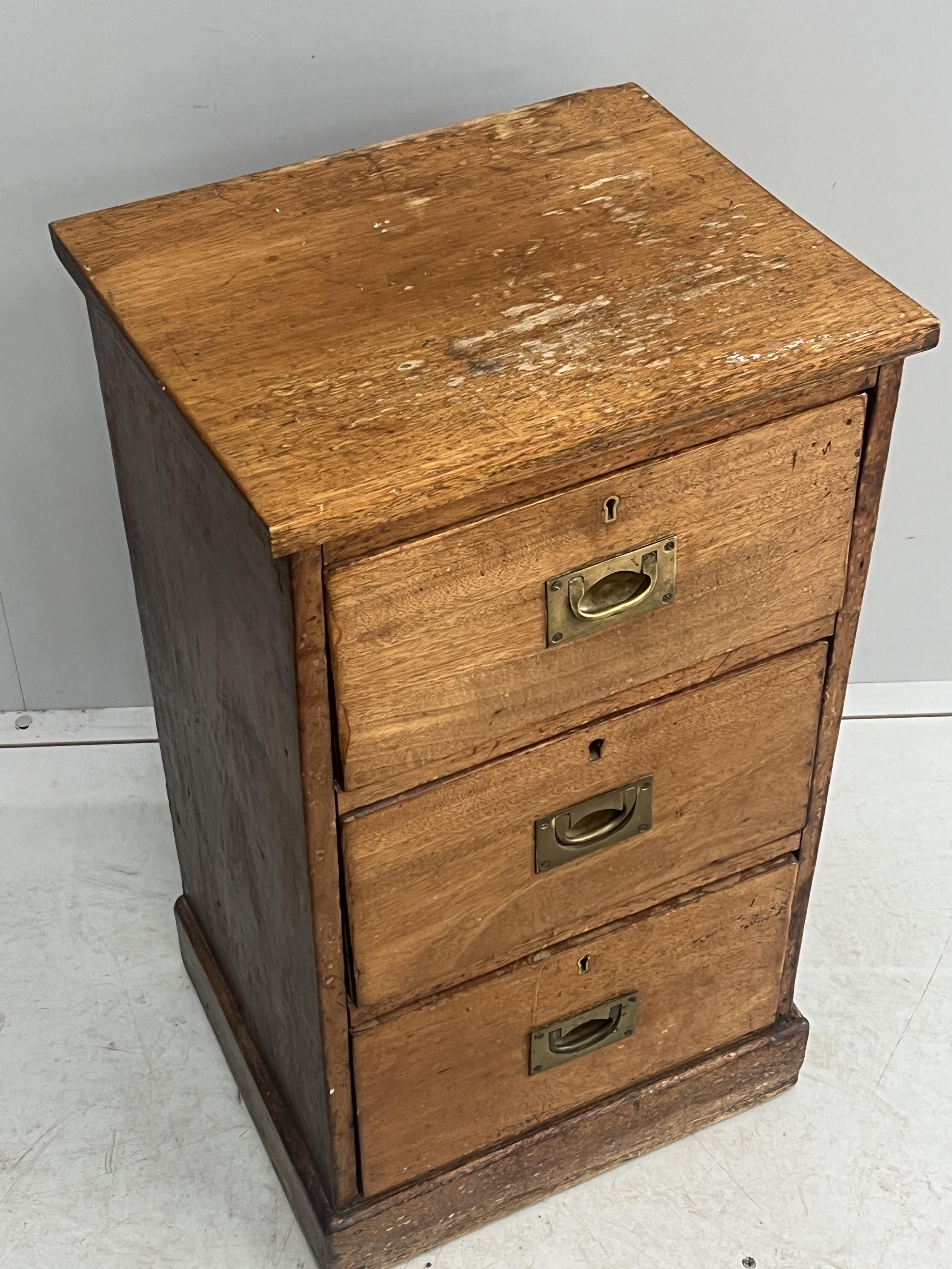 A Victorian mahogany three drawer bedside chest, adapted, width 42cm, depth 35cm, height 74cm